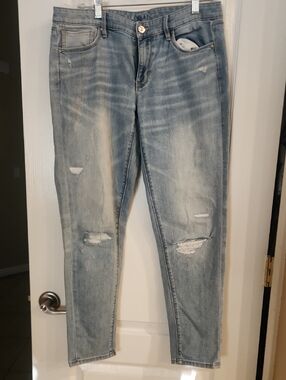 White House Black Market Light Wash Distressed Skinny Jeans